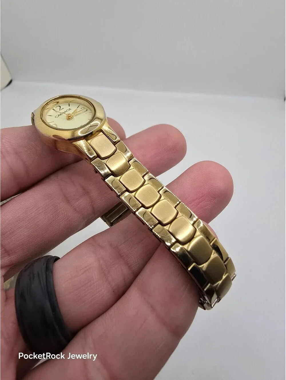 Carriage by Timex Women’s Quartz Analog Oval Gold Tone White Dial Metal Stretch